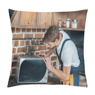 Personality  Professional Young Handyman Repairing Microwave Oven In Kitchen  Pillow Covers