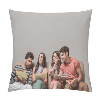 Personality  Smiling Friends Talking And Reading Books While Sitting On Sofa On Grey Pillow Covers