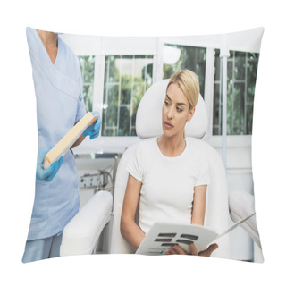 Personality  Beautiful And Happy Blonde Woman At Beauty Medical Clinic. She Is Sitting And Talking With Female Doctor About Face Esthetics Treatment. Pillow Covers