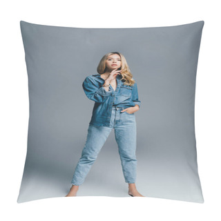 Personality  Stylish, Barefoot Woman In Denim Shirt And Jeans Looking At Camera While Posing On Grey Pillow Covers