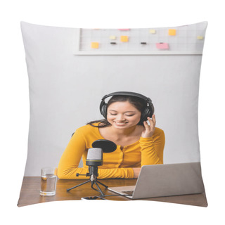 Personality  Young Asian Radio Host Touching Wireless Headphones While Sitting Near Microphone, Laptop And Smartphone With Blank Screen Pillow Covers