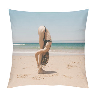 Personality  Side View Of Young Woman Standing In Forward Fold Yoga Pose On Sandy Beach Pillow Covers