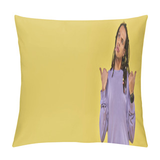 Personality  Puzzled Young Man With Dreadlocks Thumbs Pointing Different Ways On Yellow Background, Banner Pillow Covers