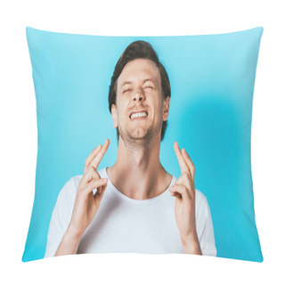 Personality  Young Man In White T-shirt With Crossed Fingers On Blue Background Pillow Covers
