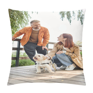 Personality  Loving Couple In Casual Attire Sit On A Wooden Deck, Enjoying The Outdoors With Their Dog. Pillow Covers