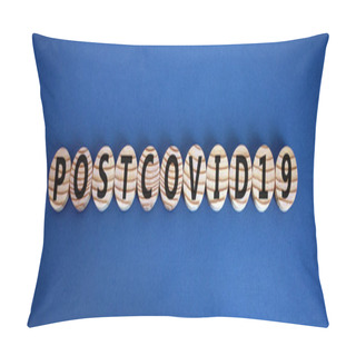 Personality  The Word 'postcovid19' On Wooden Circles On Beautiful Blue Background, Copy Space. Covid-19 Pandemic And Medical Concept. Pillow Covers