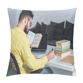 Personality  Bearded Man Studying With Book Near Laptop With Blank Screen In Modern Office Pillow Covers