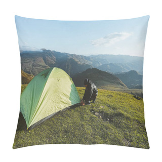 Personality  Male Hiker Is Setting Up A Bright Green Tent In The Mountains. Concept Of Tourism, Hiking And Staying In Nature. Pillow Covers