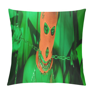 Personality  Passionate Woman In Orange Balaclava Holding Silver Neck Chain Near Wall With Graffiti In Green Light, Banner Pillow Covers