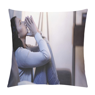Personality  Depressed Woman In Casual Clothes Sitting On Sofa With Praying Hands Near Mouth And Looking Up At Home Pillow Covers