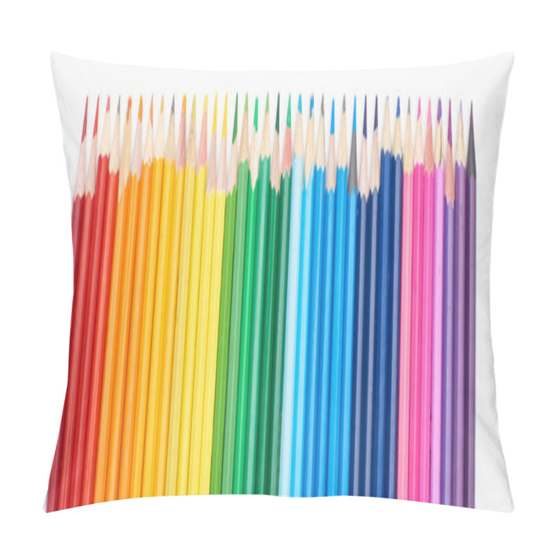 Personality  Panoramic shot of rainbow spectrum made with straight row of color pencils isolated on white pillow covers