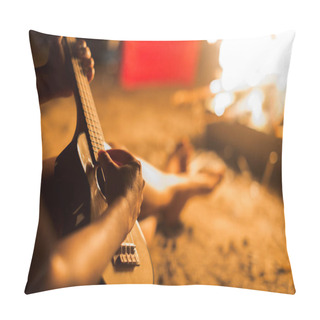 Personality  A Musician Woman Playing Ukulele Guitar Next To A Campfire On The Beach. Pillow Covers