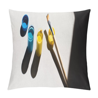 Personality  High Angle View Of Blue And Yellow Paint In Jars Near Paintbrush On White, Banner Pillow Covers