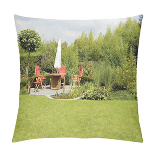Personality  Dining Table With Chairs And Parasol In A Lush Garden Pillow Covers