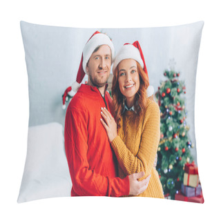 Personality  Happy Young Couple In Santa Hats Embracing While Looking At Camera Pillow Covers