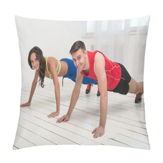 Personality  Training. Beautiful Girl And Handsome Guy Workout Together Making Push Ups On The White Wooden Floor Pillow Covers