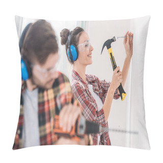 Personality  Selective Focus Of Young Couple Hammering And Drilling Wall During Renovation Pillow Covers