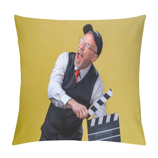 Personality  Film Directing. Film Production. Human Emotions. Man With Movie Flap While Filming. Close Up. Pillow Covers