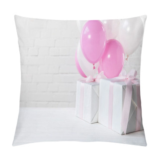 Personality  Presents On Table With White And Pink Balloons On White Brick Wall Background Pillow Covers