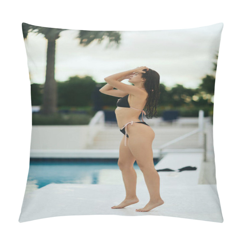Personality  sexy brunette woman dressed in black bikini adjusting her wet hair after swimming, standing next to outdoor swimming pool in vibrant city of Miami, USA, luxury resort, blurred background  pillow covers