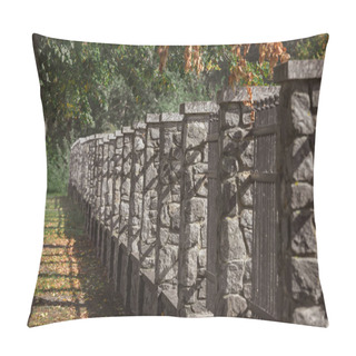 Personality  Selective Focus Of Stone Fence Under Trees Outdoors  Pillow Covers