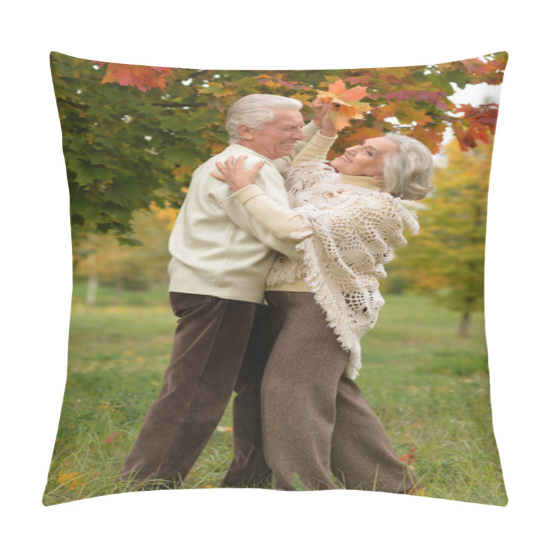 Personality  senior couple lying on green grass pillow covers