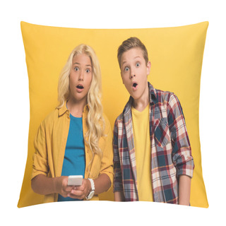 Personality  Shocked Kids Holding Smartphone And Looking At Camera On Yellow Background  Pillow Covers