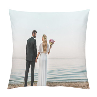 Personality  Back View Of Wedding Couple Standing On Beach With Wedding Bouquet And Looking At Each Other Pillow Covers