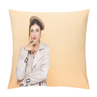 Personality  Fashionable Woman In Trench Coat And Beret Touching Chin While Looking At Camera On Peach Pillow Covers