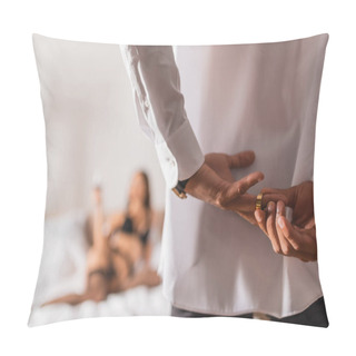 Personality  Selective Focus Of Man With Hands Behind Back Taking Off Wedding Ring With Woman In Underwear On Bed  Pillow Covers