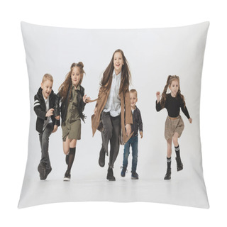Personality  Happy School And Preschool Age Children, Girls And Boys Running, Jumping Isolated On Grey Studio Background. Beauty, Kids Fashion, Education, Happy Childhood Concept. Pillow Covers