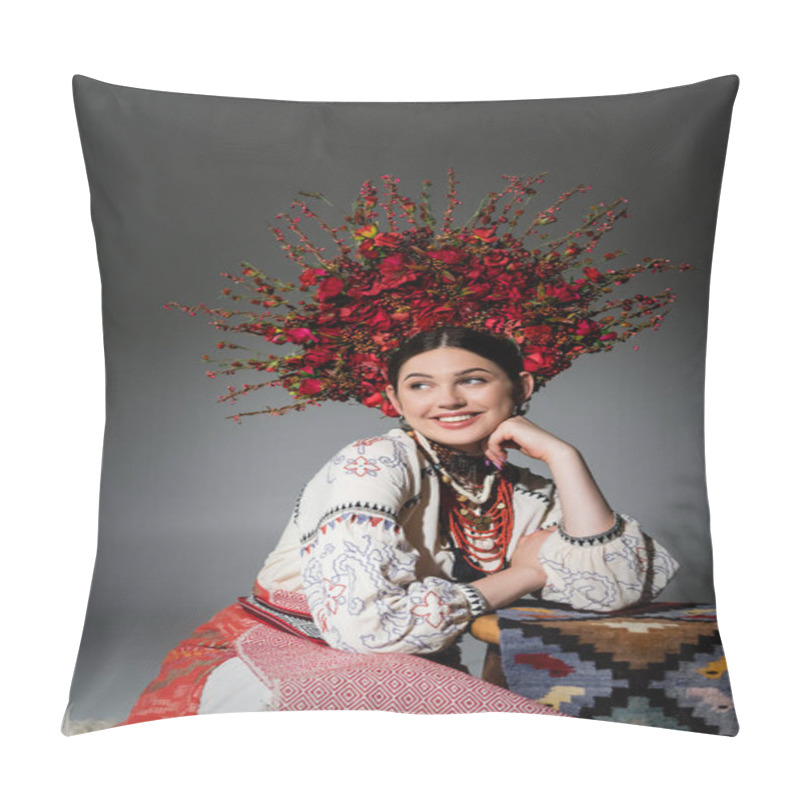 Personality  happy ukrainian woman in traditional clothes and floral red wreath on grey pillow covers