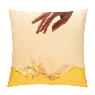 Personality  Cropped View Of Hand And Yellow Bright Splashing Liquid Isolated On Yellow Pillow Covers