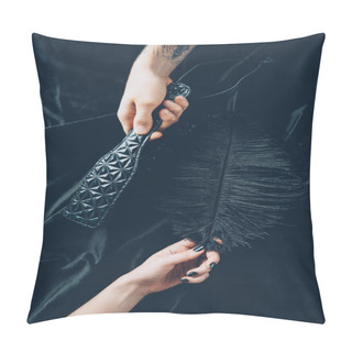 Personality  Cropped Shot Of Couple Holding Black Feather And Leather Spanking Paddle Pillow Covers