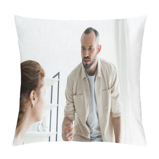 Personality  Selective Focus Of Angry Man Showing Fist While Looking At Wife At Home  Pillow Covers