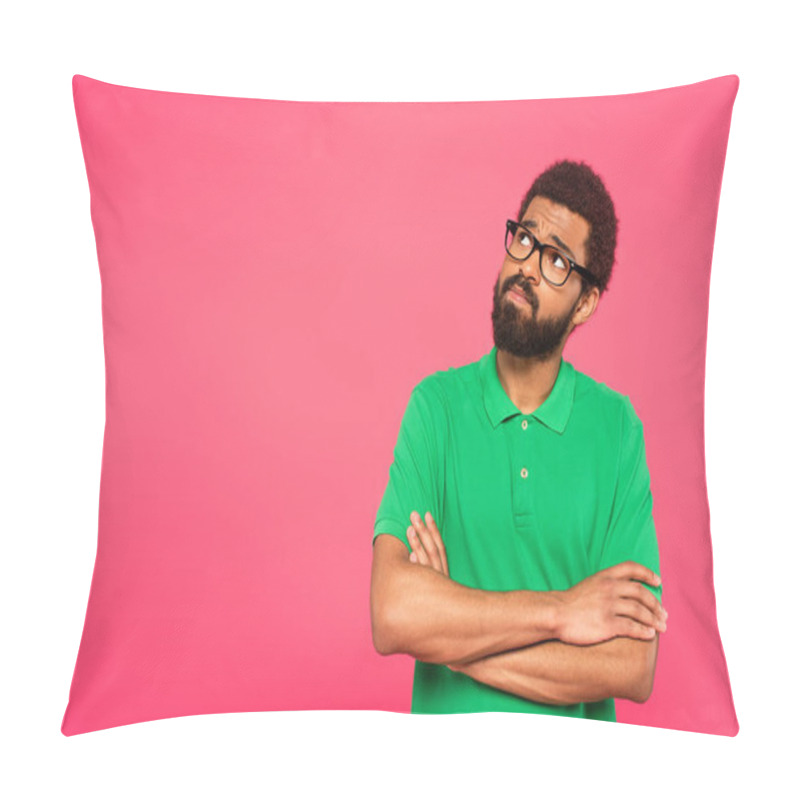 Personality  pensive african american man in glasses looking away while standing with crossed arms isolated on pink pillow covers