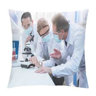 Personality  Chemists Using Microscope And Discussing Pillow Covers