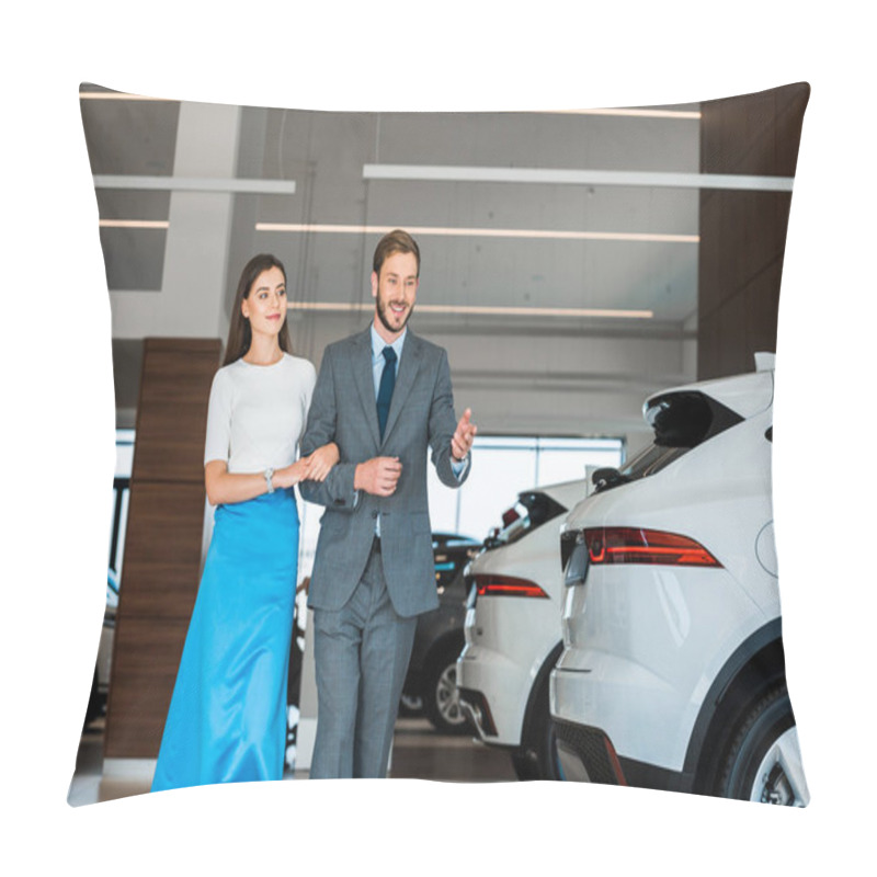 Personality  Happy Bearded Man Gesturing While Walking With Woman In Car Showroom  Pillow Covers