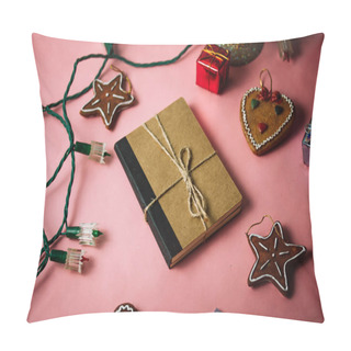 Personality  Aesthetic Composition Of Decorations And Gifts On Pink Table. A Brown Paper Kraft Notebook Lay Among Garlands, Christmas Toys In Form Of Star-shaped Cookies, Garlands. New Year Festive Decor For Party Pillow Covers