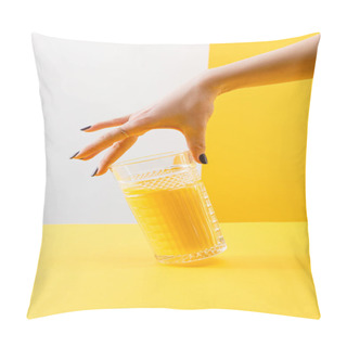Personality  Cropped View Of Woman Holding Glass Of Fresh Delicious Yellow Smoothie On Grey And Yellow Background Pillow Covers
