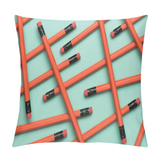 Personality  Top View Of Arranged Red Graphite Pencils With Erasers On Green Pillow Covers