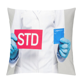 Personality  Cropped View Of Doctor In White Coat And Latex Gloves Holding Paper With Std Lettering And Condom Isolated On Grey  Pillow Covers