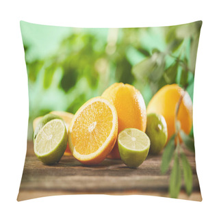Personality  Selective Focus Of Cut, Whole Oranges And Limes On Wooden Surface  Pillow Covers