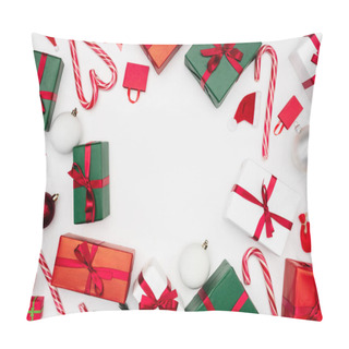 Personality  Frame Of Multicolored Gift Boxes, Candy Canes And Christmas Baubles On White Pillow Covers
