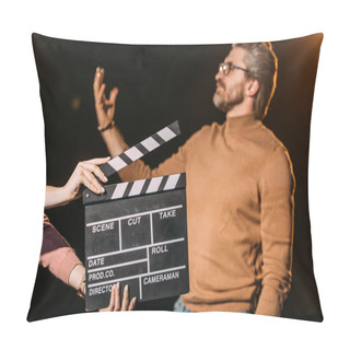 Personality  Selective Focus Of Mature Actor Performing Role With Clapboard In Front  Pillow Covers