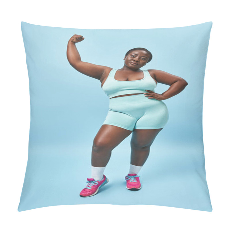 Personality  Energetic Plus Size Woman In Active Wear Flexing Her Muscles On Blue Background, Hand On Hip Pillow Covers