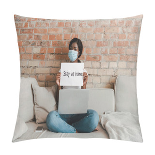 Personality  African American Freelancer In Medical Mask With Laptop Near Smartphone Showing Placard With Stay At Home Lettering On Sofa In Living Room Pillow Covers