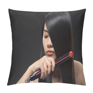 Personality  Portrait Of Young Asian Woman Straightening Hair With Hair Straightener Isolated On Black Pillow Covers