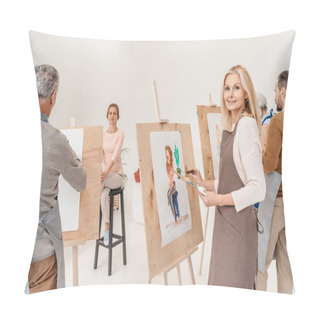 Personality  Mature Woman Smiling At Camera While Painting On Easel At Art Class Pillow Covers