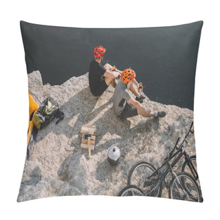 Personality  High Angle View Of Active Bike Travellers Eating Canned Food On Rocky Cliff Over Lake Pillow Covers